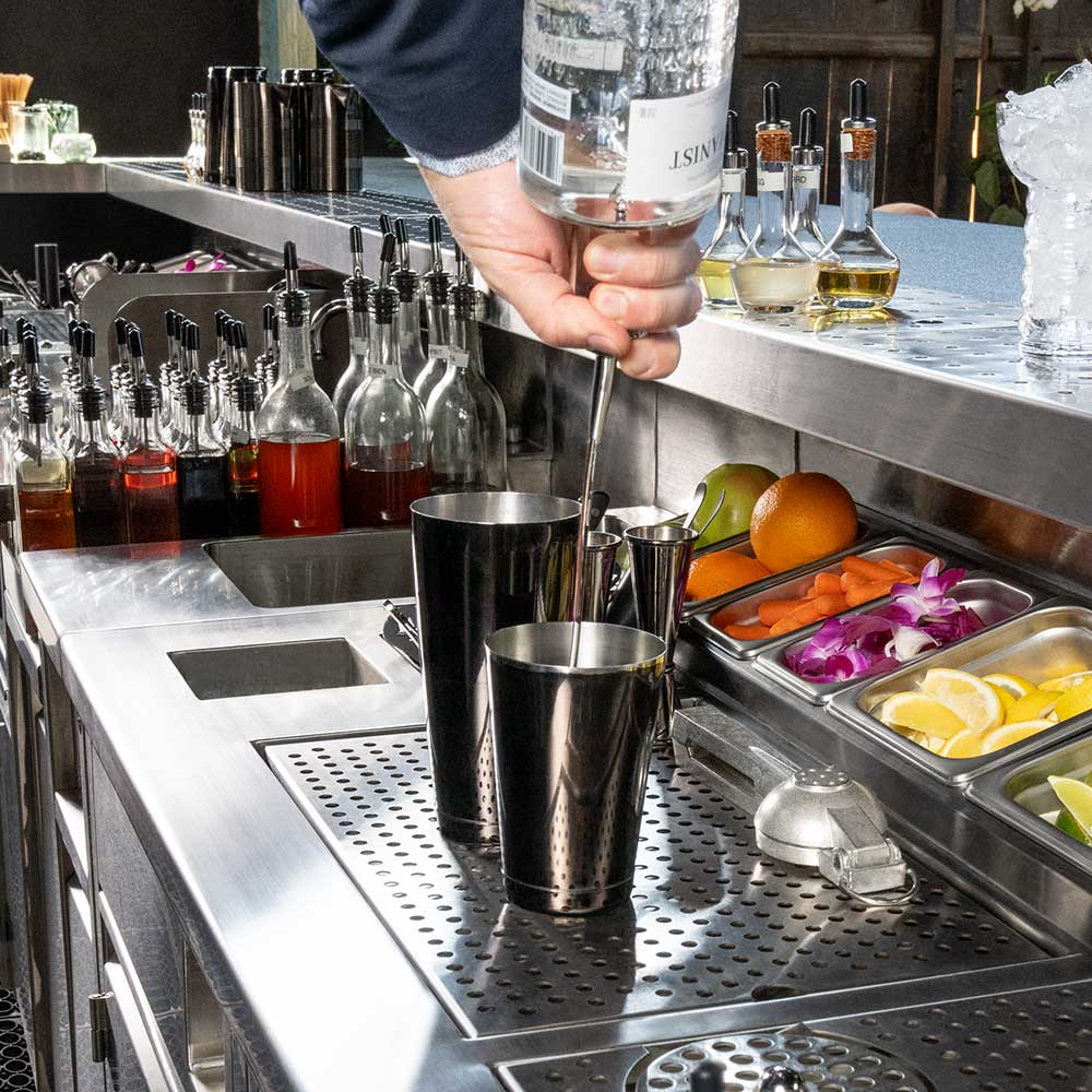 EuroBar Bar Station with bartender pouring a drink